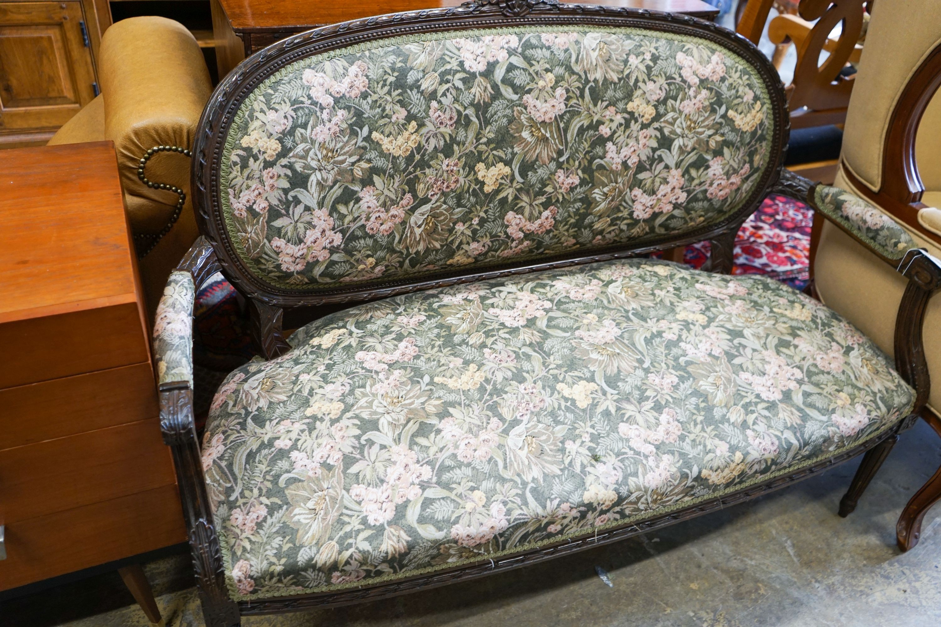 An early 20th century French carved frame upholstered canape, length 132cm, depth 52cm, height 94cm
